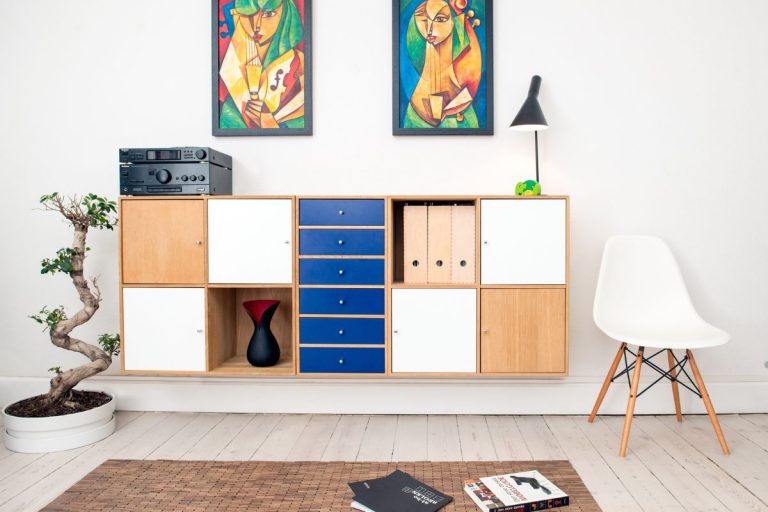 A simple white chair, showcasing a modern design, suitable for various furniture service applications.